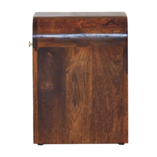 Profile view of the chestnut nightstand, highlighting the smooth curve from top to back.