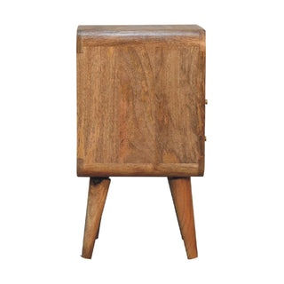 Full side profile of the curved wooden bedside table, showing the deep wood grain and two tapered legs.