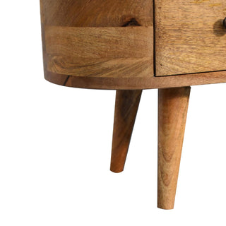 Close-up showing the rounded side panel and the two tapered wooden legs of the entertainment unit.