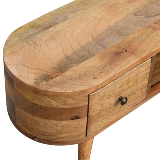 Close-up showing the natural wood grain texture on the rounded top and side panel of the unit.