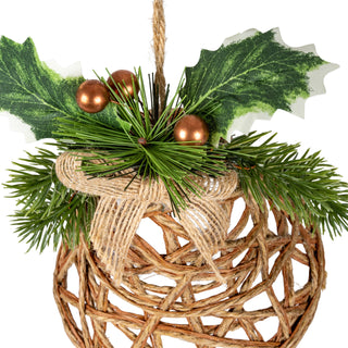 Close detail of the rattan weave and the decorative elements: faux pine, holly leaves, and bronze berries.