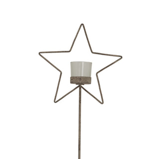 Front view detail of the distressed metal star frame and the glass votive cup insert.