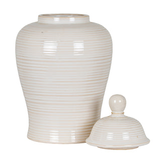 Cream ceramic ginger jar shown with the ribbed lid removed and resting beside the main body.