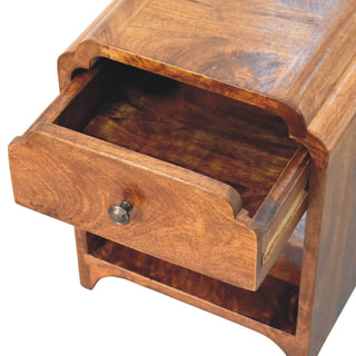 Detail shot showing the nightstand's drawer fully open, revealing the interior wood grain and storage space.