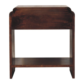 Front elevation of the dark walnut nightstand, highlighting the scalloped top edge and the open storage area above the lower shelf.