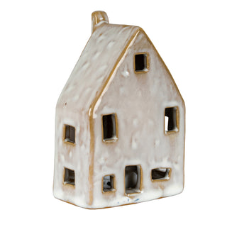 Tall ceramic house decoration featuring a peaked roof and chimney detail.