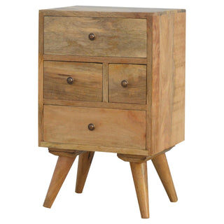 Close view highlighting the natural wood grain, varied colour tones, and small round brass drawer pulls.