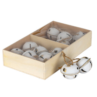 Twelve distressed white metal bells with twine loops, packaged in a light wooden box with two compartments.