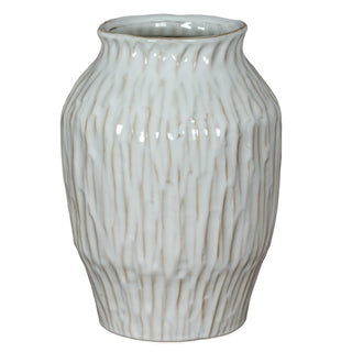 White ceramic vase with a textured surface featuring irregular vertical grooves and a glossy glaze.