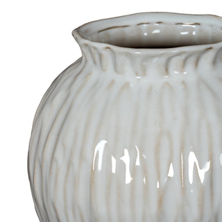 Close-up of the vase shoulder showing the ruffled neck, vertical ridges, and rustic beige wash in the grooves.