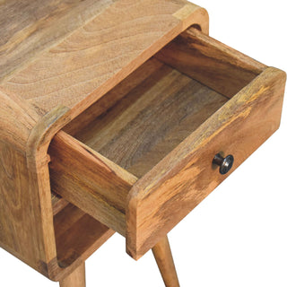 Detail shot showing the open drawer, interior wood grain, and black metal pull knob.
