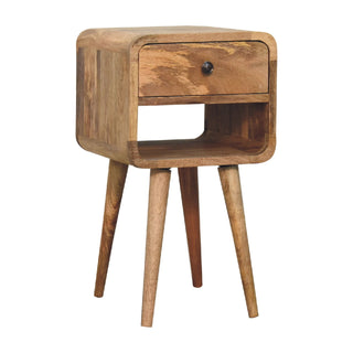 Front view of the bedside table showing the curved body and angled tapered mid-century style legs.