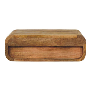 Front view of the wall-mounted wooden nightstand, highlighting the recessed handleless drawer opening.