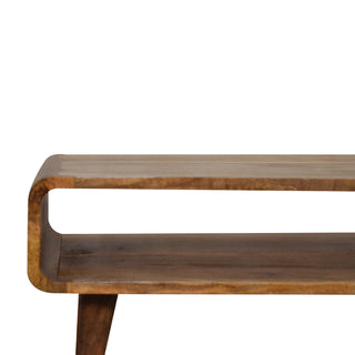 Close-up detail showing the rounded end, open shelf space, and tapered wooden leg.