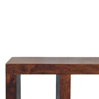 Close-up detail of the chestnut wood grain and thick construction, highlighting the joint with the grey vertical support.