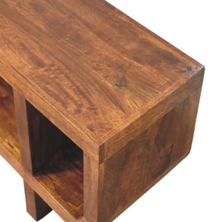 Close-up of the chestnut wood grain on the top surface and the thick corner joint construction.