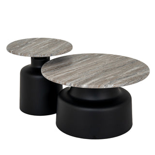 Two nested round coffee tables with grey marble tops and matte black pedestal bases.