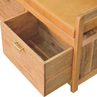 Close-up showing one oak-ish drawer pulled open, revealing the internal wooden storage space and the brass bar handle.