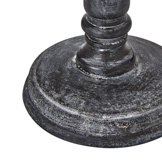 Tight detail of the lamp base foot, highlighting the distressed dark grey wood and whitewash effect.