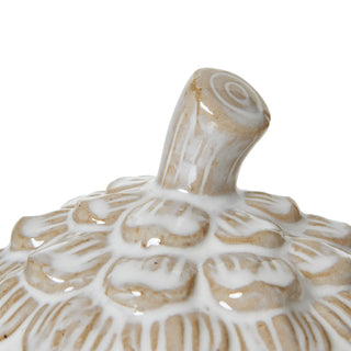 Detail shot of the pine cone lid apex, highlighting the curved ceramic stem and glazed scales.
