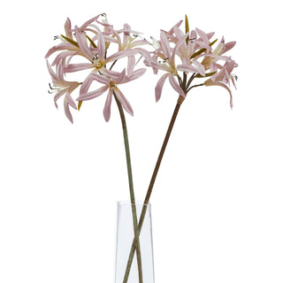 Two artificial pink lily stems in a clear rectangular vase.