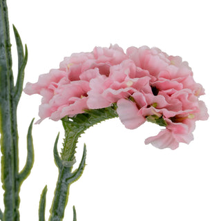 Close detail of the artificial pink statis flower cluster and the moulded green stem texture.