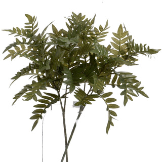 Full view of the artificial green foliage bunch against a white background, highlighting the dark stems and segmented leaves.