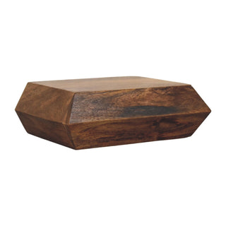 Angled view of the dark wood wall shelf showing the hexagonal shape and deep wood grain texture.