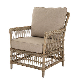 A single outdoor armchair component with woven rattan frame and thick beige cushions.
