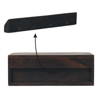 Wall mounting bracket shown above the dark wood drawer unit, illustrating installation.