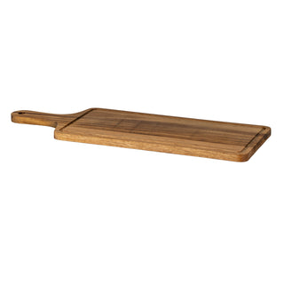 Perspective view of the long rectangular acacia serving board with handle and perimeter juice groove.