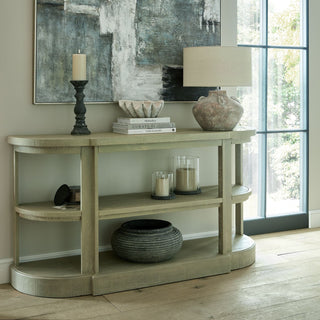Refined LED candle on a dark holder on a wooden console table in a room setting.