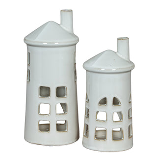 Large glazed white ceramic lighthouse holder shown next to the smaller version for scale.