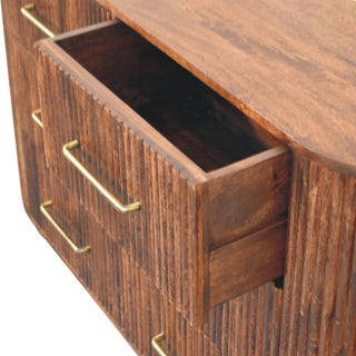 Close-up of the roasted almond chest showing the top drawer pulled open, revealing the interior and construction.