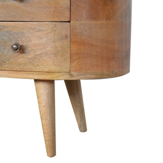 Close-up of the tapered wooden legs and curved base of the entertainment unit.