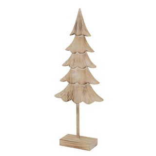 Rustic wooden fir tree decoration viewed slightly from the side, showing the layered carving detail and square base.