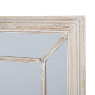 Close-up of the textured washed wood frame and the intersection of the window pane detailing.
