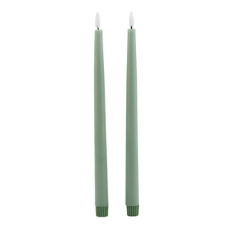 Pair of sage green LED dinner candles shown front-on against a white background.