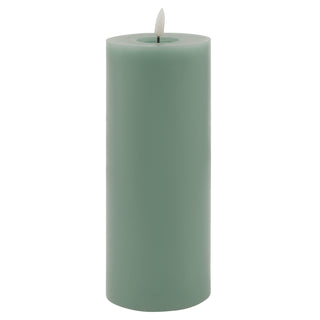 Sage green LED pillar candle with a melted top effect, shown front-on against a white background.