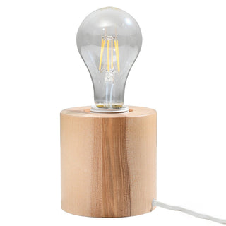 Plain front-on view of the Salgado lamp featuring a cylindrical natural wood base and a clear exposed filament bulb.