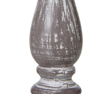 Close up of the distressed grey wash finish on the turned wooden base, showing heavy brush strokes.
