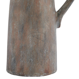 Detail shot of the lower section, highlighting the rustic, mottled brown and grey surface finish.