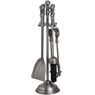 Silver nickel fireplace tools hanging on the stand, highlighting the detailed ball handles.
