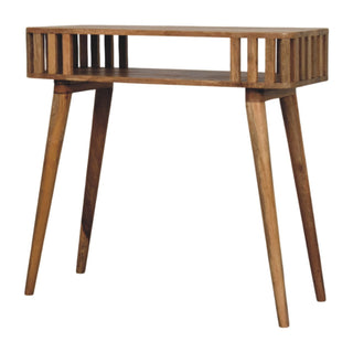 Front-on view of the wooden console table featuring slatted sides, a shelf, and angled tapered legs.