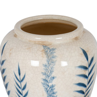 Close-up of the vase rim showing the cream crackle glaze texture and blue painted fern detail.