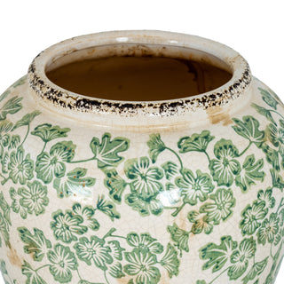 Close-up showing the vase opening, aged dark rim, and view into the brown interior.