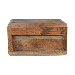 Front view of the unit showing the rectangular storage opening and multi-toned wood grain.