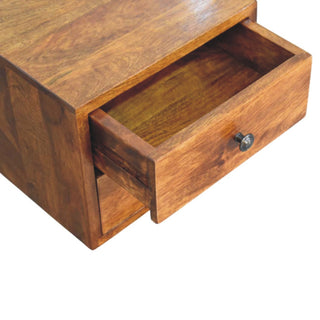 Detail view of the chestnut nightstand showing the top drawer fully open, highlighting the internal wood finish.
