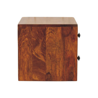 Left side view of the chestnut nightstand highlighting the wood grain texture and dark drawer handles.