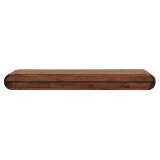 Dark wooden console viewed directly from the front edge, showing the thickness and rounded profile.